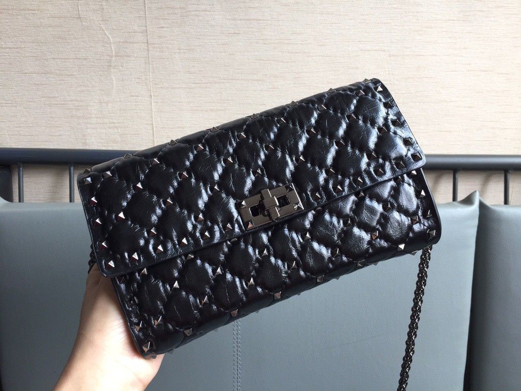 Valentino Rockstud Spike Crossbody Clutch Bag In Black Lambskin